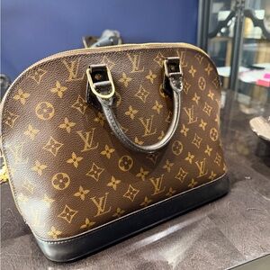 Louis Vuitton “Alma” Classic Monogram Satchel